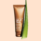 CLARINS لوشن الحليب للتسمير الذاتي