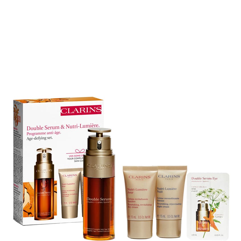 CLARINS مجموعة سيروم مزدوج ونيوتري لوميير لمكافحة علامات تقدم السن